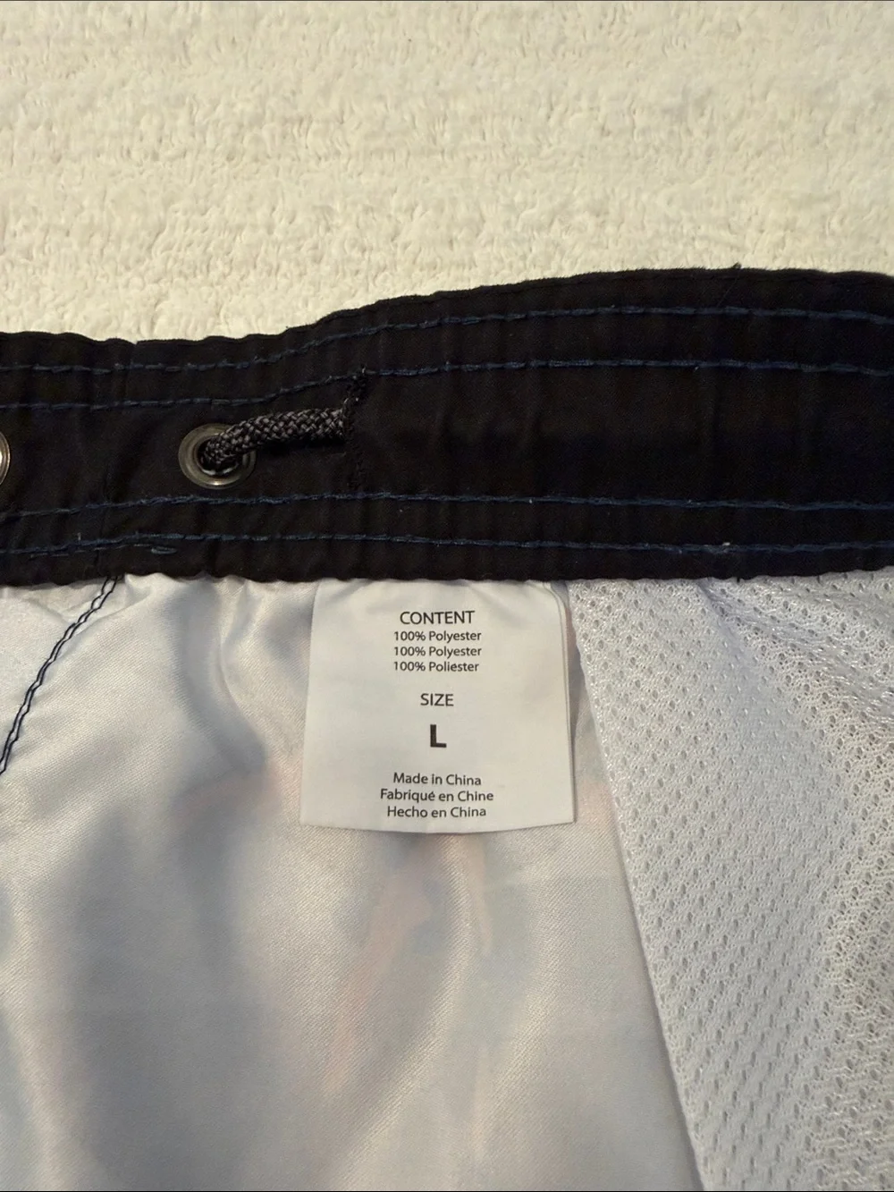 O’Neill bathing suit with two pockets one back pocket with Velcro
